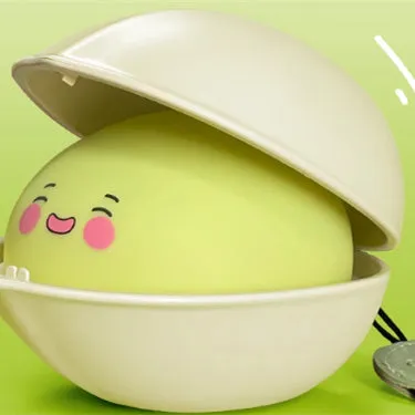 Pistachio-shaped silicone night light with LED bulb and data cable, designed for babies and toddlers as a sleep aid