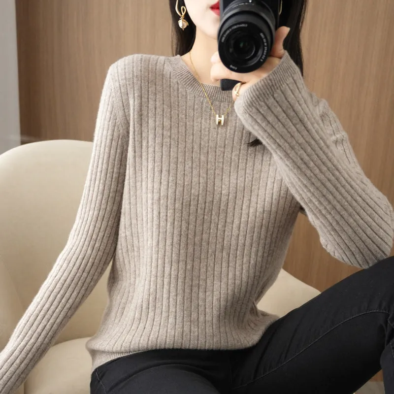 Autumn women's knitwear round neck sweater in beige, low collar long sleeve pullover on model