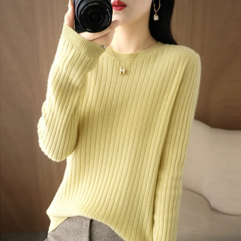 Autumn women's knitwear round neck sweater in beige, low collar long sleeve pullover on model