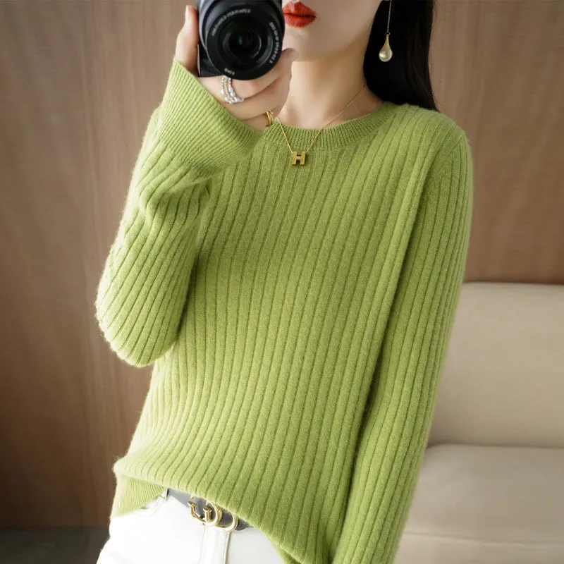 Autumn women's knitwear round neck sweater in beige, low collar long sleeve pullover on model