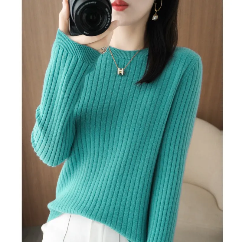 Autumn women's knitwear round neck sweater in beige, low collar long sleeve pullover on model