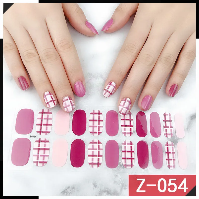 Korean nail sticker sheets showing strawberry, flower, bow, and embossed patterns with included nail file