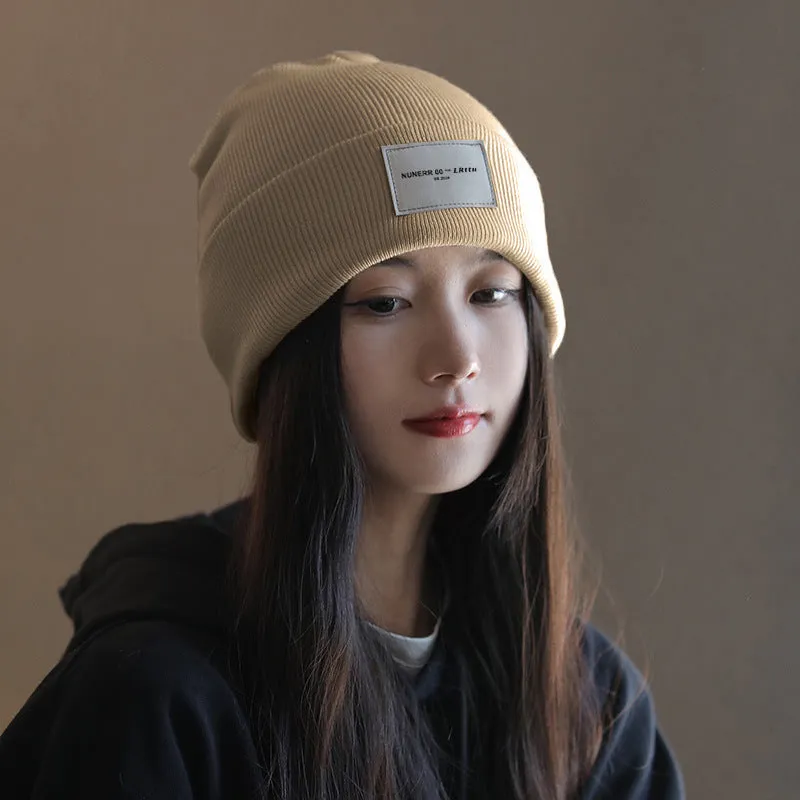 Women's knitted hat in beige, dome crown style, polyester fabric, free size, winter autumn accessory