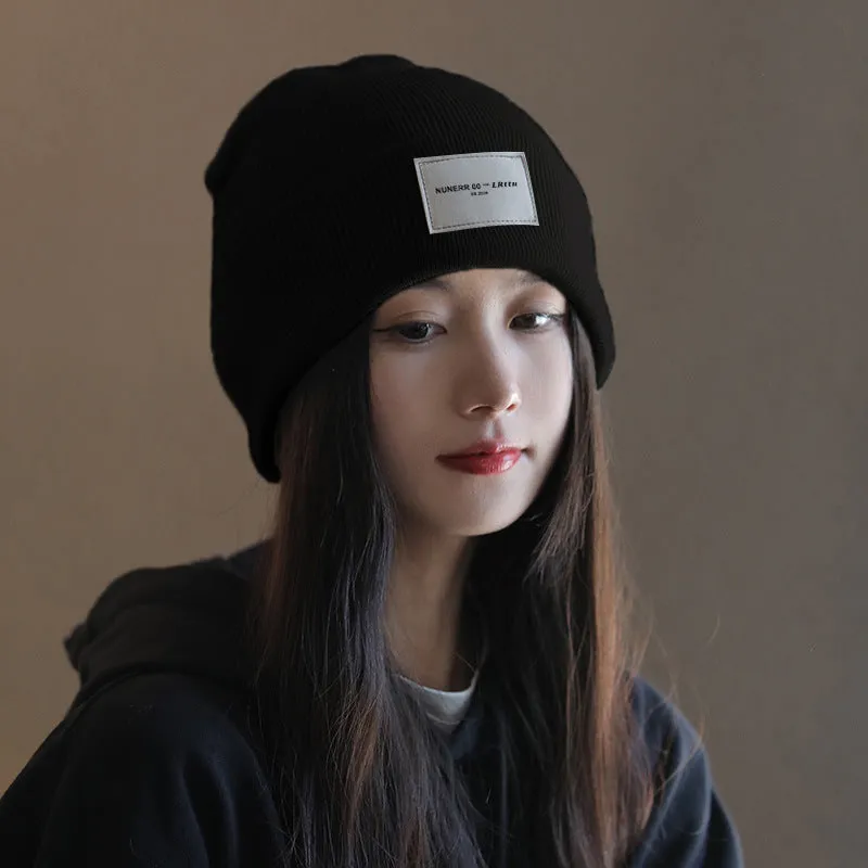 Women's knitted hat in beige, dome crown style, polyester fabric, free size, winter autumn accessory