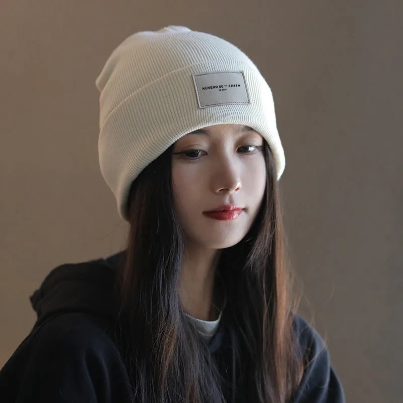 Women's knitted hat in beige, dome crown style, polyester fabric, free size, winter autumn accessory