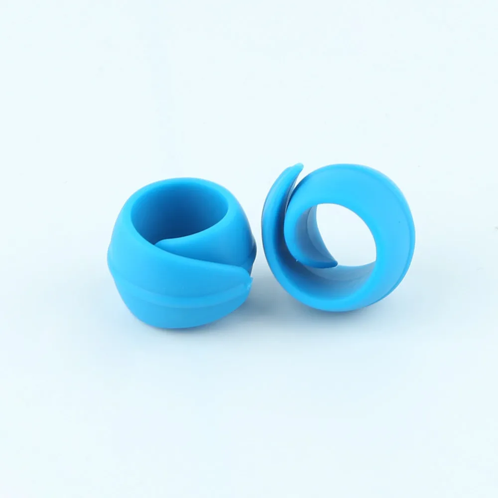 14 silicone sewing spool fixed clips in red, blue, orange, and green on a white background