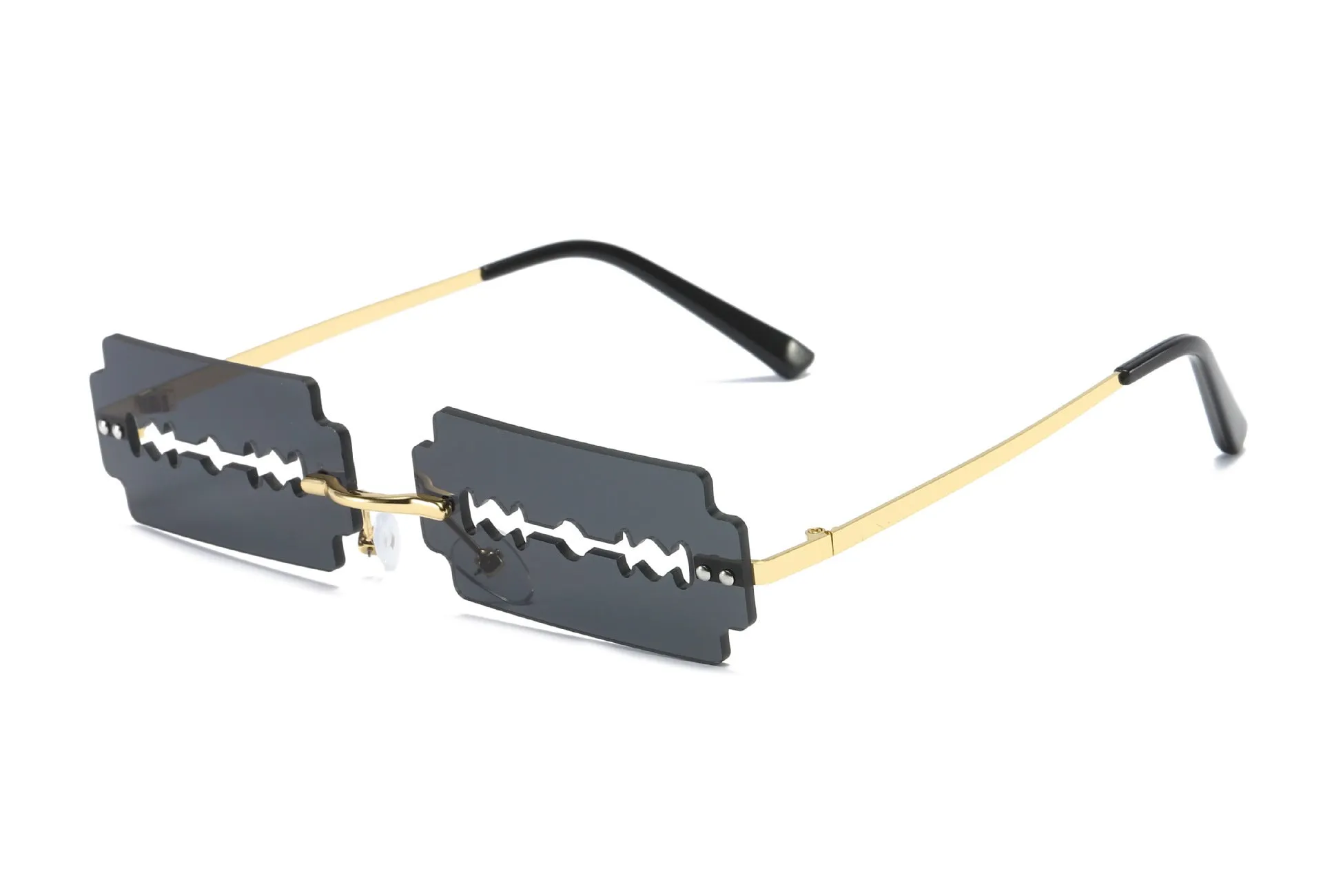 Women's gold metal rimless sunglasses with UV400 PC lenses on a light background