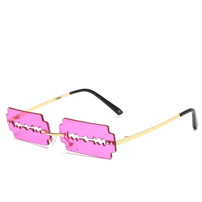 Women's gold metal rimless sunglasses with UV400 PC lenses on a light background