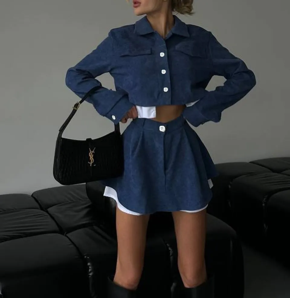 Women's two-piece set with long sleeve cardigan and cake short skirt in black, with blended fabric.