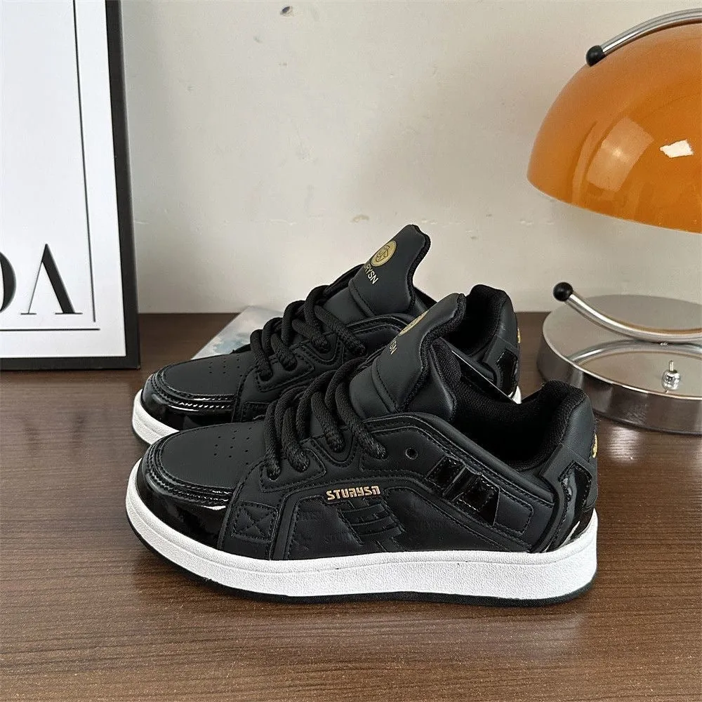 Men's black PU leather round toe board shoes with thick rubber sole on plain background