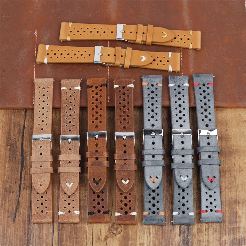 Handmade retro genuine leather watch band in brown with white stitching on a wooden surface