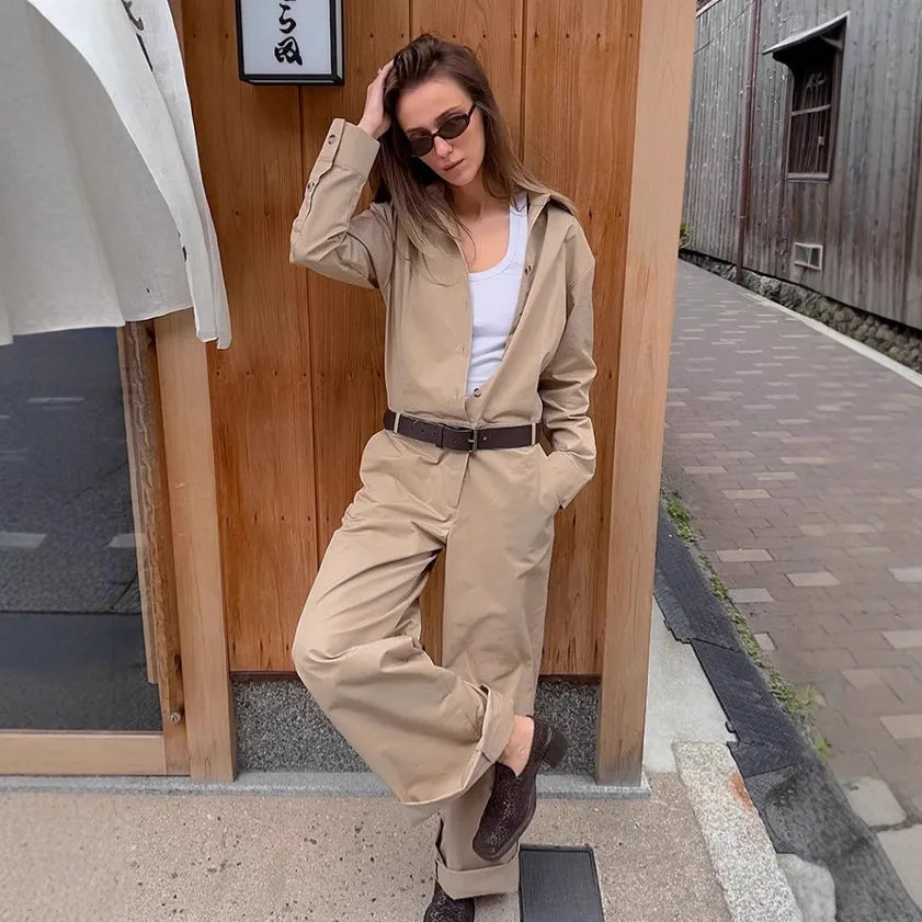 Khaki cargo overalls with drop-shoulder sleeves and mid-waist trouser cut front view