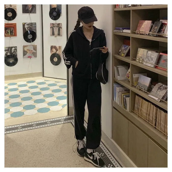 Striped polyester two-piece pants suit set for women in light gray or black with top and trousers coordinated