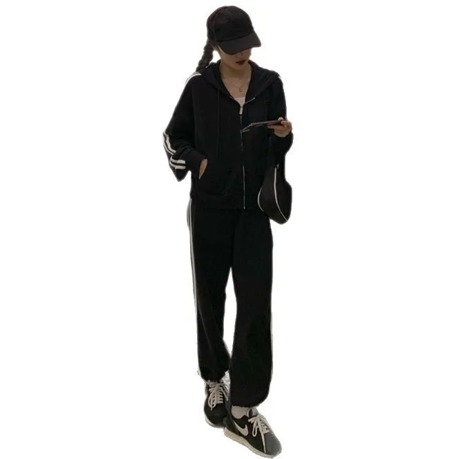 Striped polyester two-piece pants suit set for women in light gray or black with top and trousers coordinated