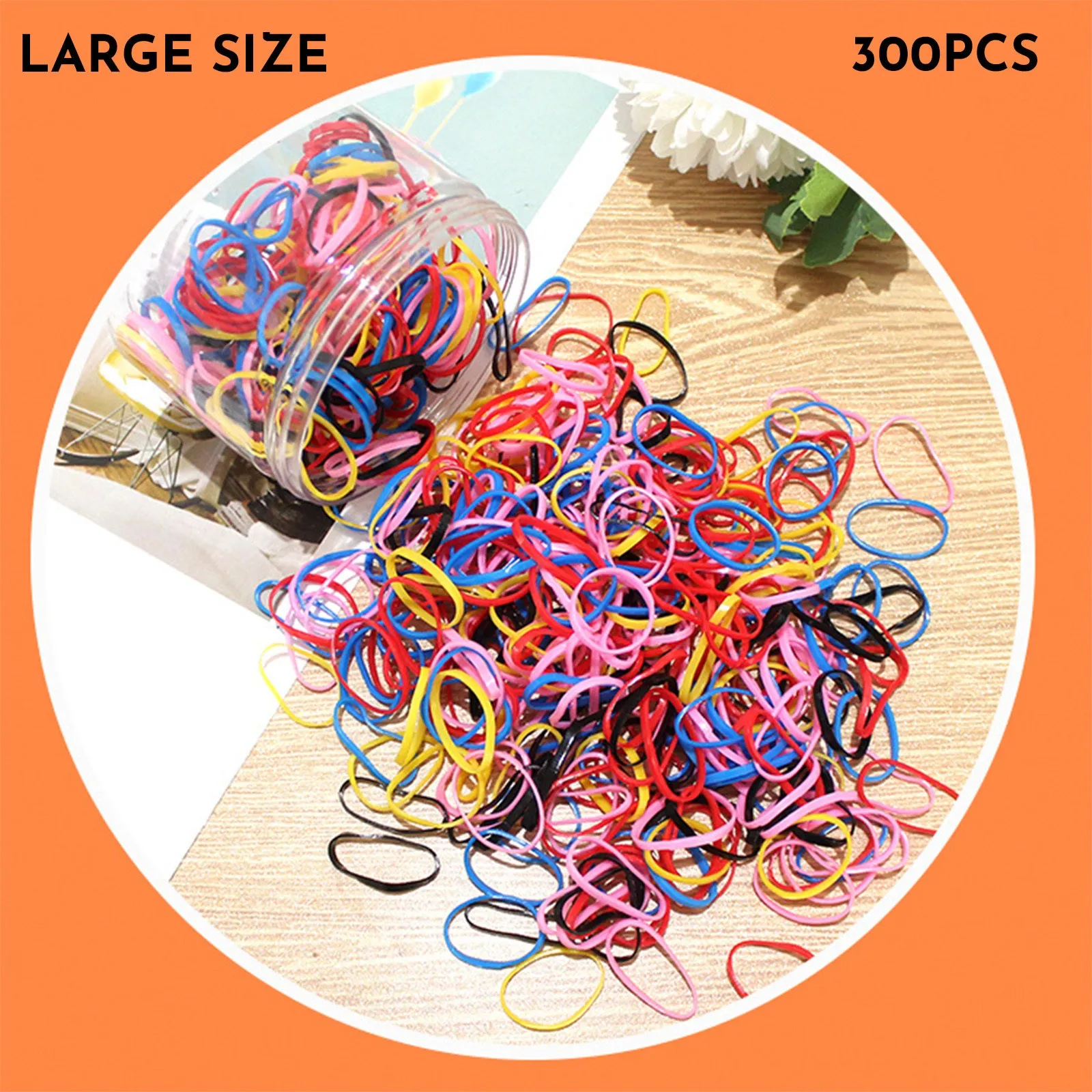 Multi-colour assortment of thin TPU baby hair ties in a re-useable plastic storage container.