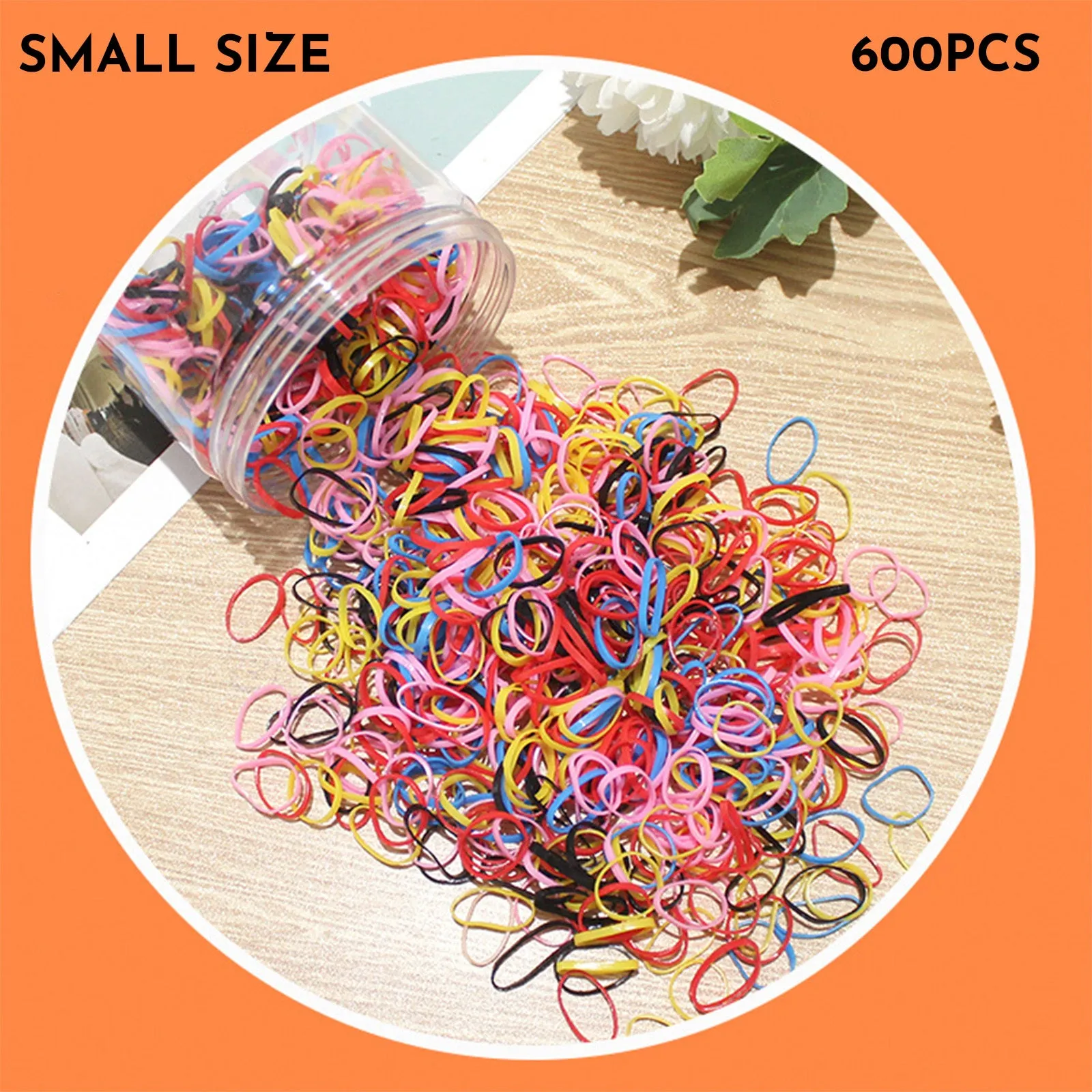 Multi-colour assortment of thin TPU baby hair ties in a re-useable plastic storage container.