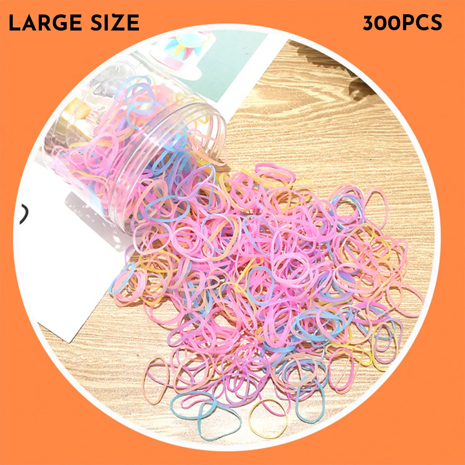 Multi-colour assortment of thin TPU baby hair ties in a re-useable plastic storage container.