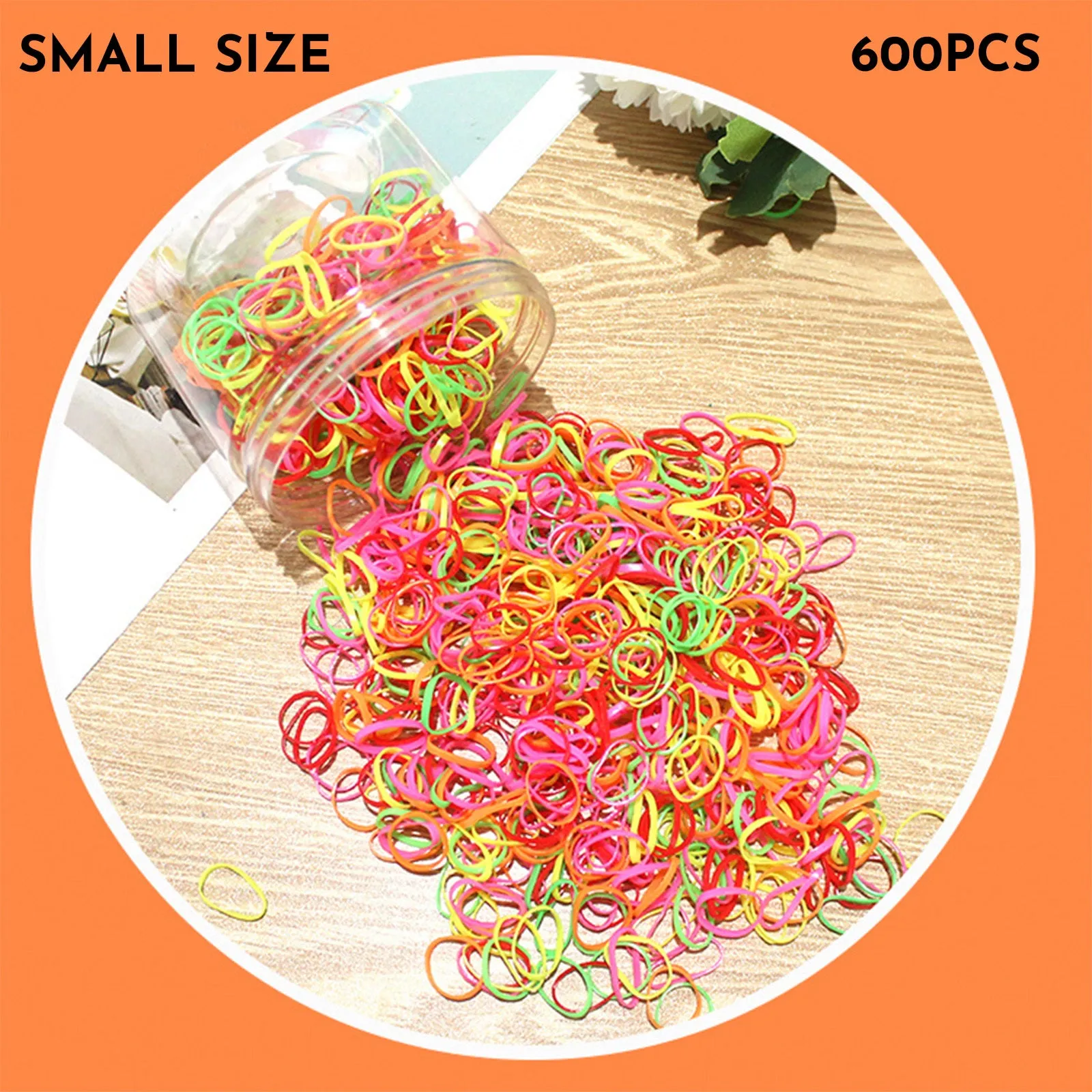 Multi-colour assortment of thin TPU baby hair ties in a re-useable plastic storage container.