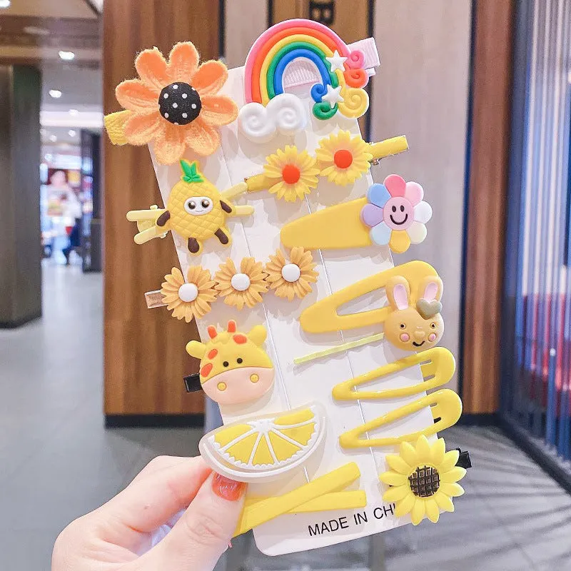 14-piece toddler hair accessories set showing colourful rainbow barrettes, candy fruit clips and butterfly designs