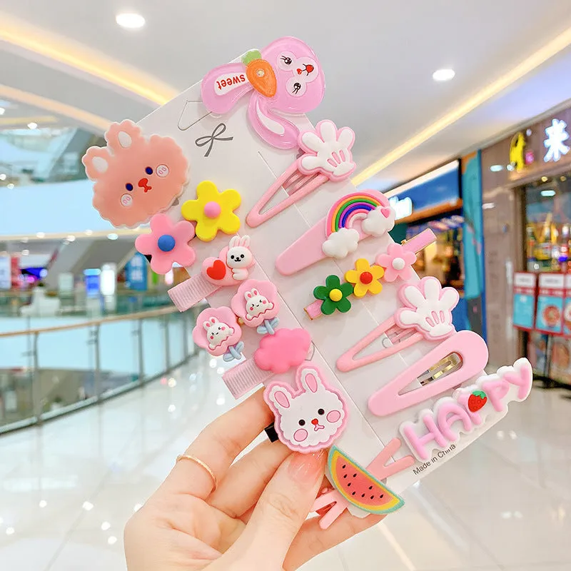 14-piece toddler hair accessories set showing colourful rainbow barrettes, candy fruit clips and butterfly designs