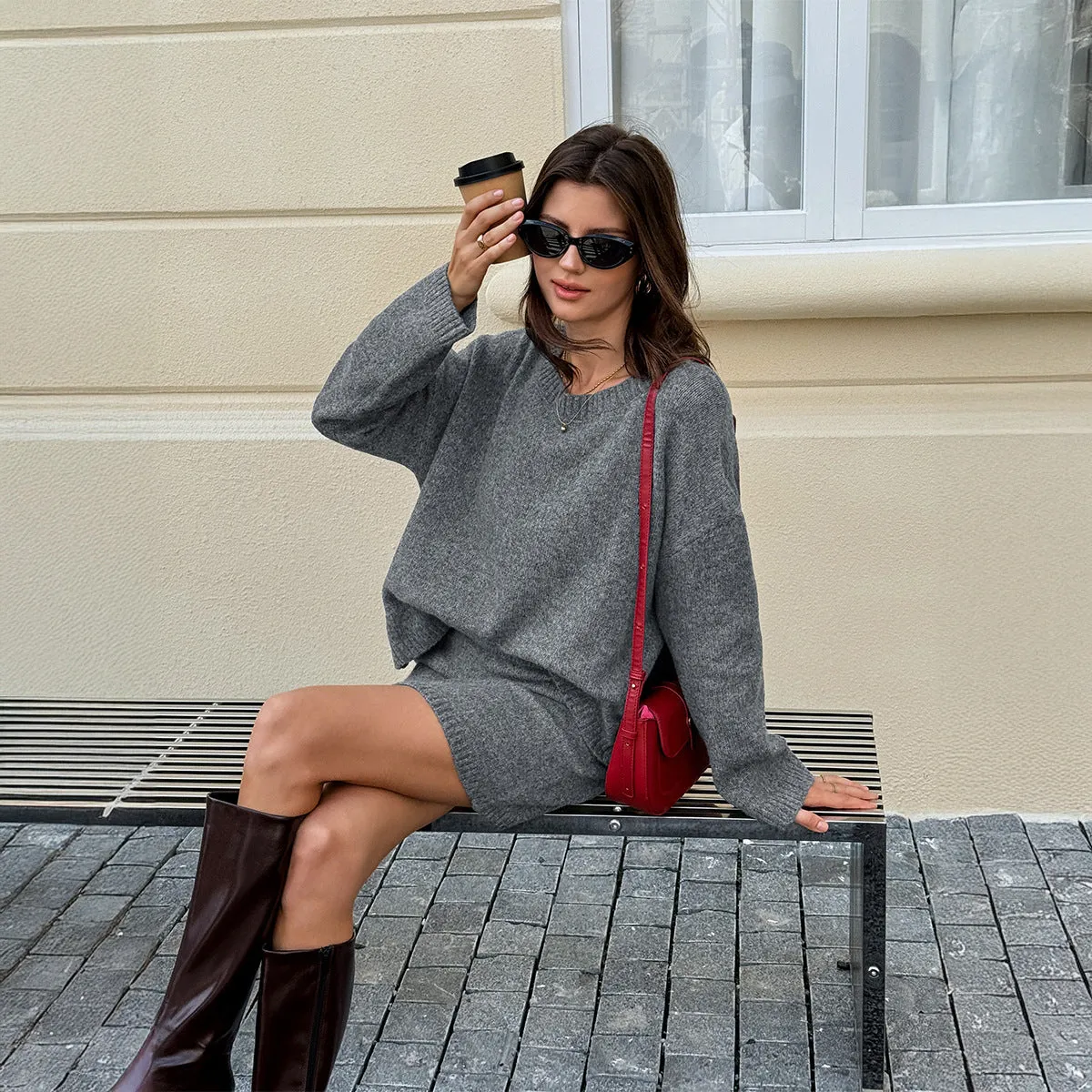 Women's solid grey wool blend knit sweater and skirt suit with long sleeves, shown as a two-piece casual set