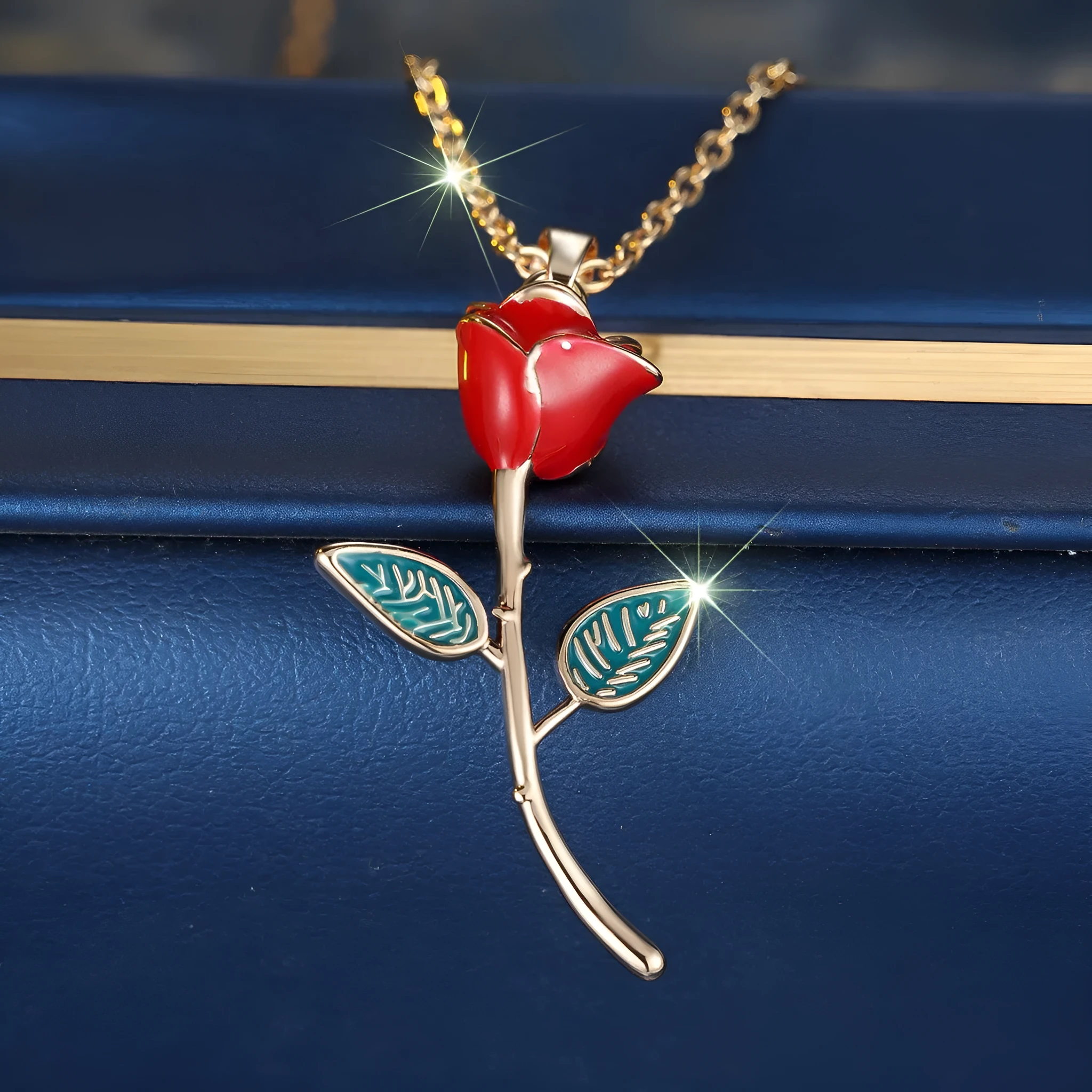 Champagne gold rose pendant necklace with copper drip oil finish and O-ring chain on display
