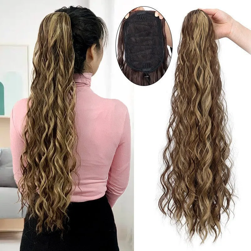 Long curly water ripple hair extension with fluffy corn curler texture in a drawstring ponytail style.