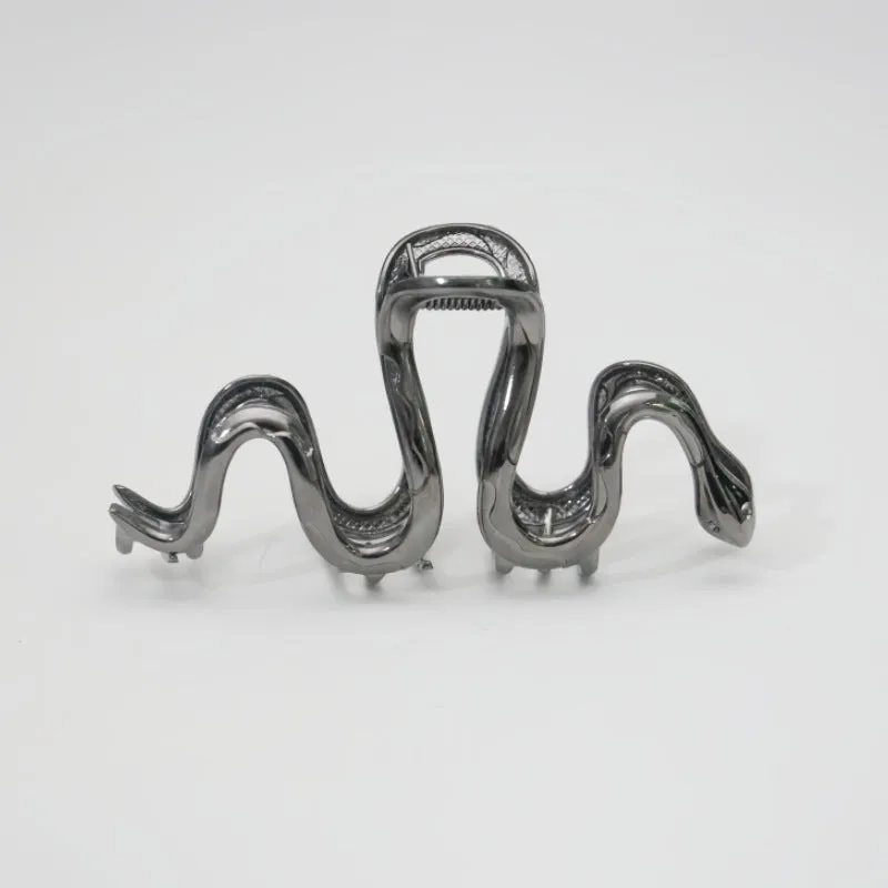 Silver Slytherin serpentine snake design metal hair barrette measuring 10.5cm.