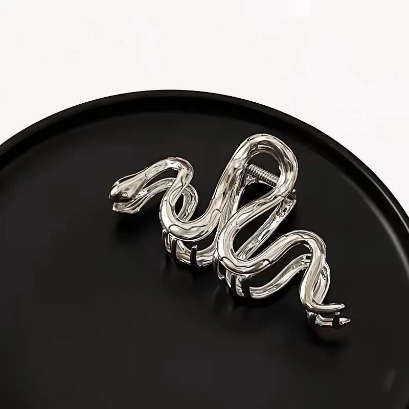 Silver Slytherin serpentine snake design metal hair barrette measuring 10.5cm.