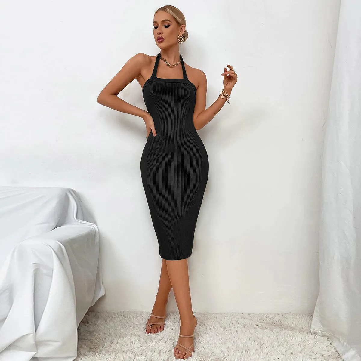Ribbed mid-waist pencil dress with backless neck strap in green and black polyester, sizes S to XL