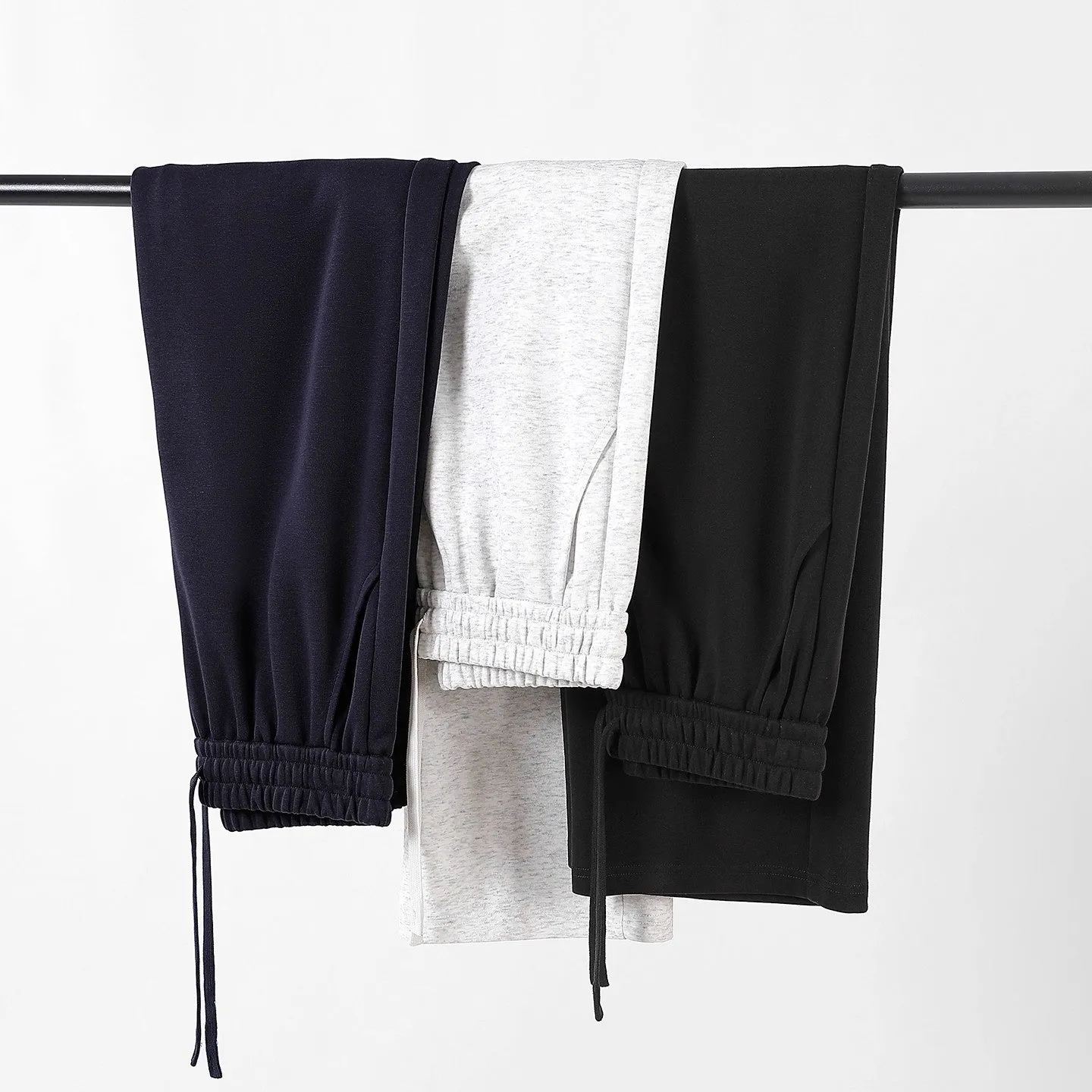 High-waisted straight-leg cotton pants in heather gray, loose fit, available in multiple colours