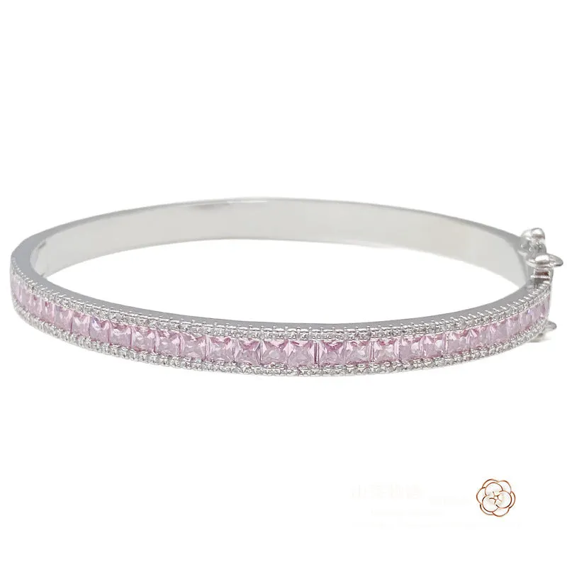 Rainbow colourful copper geometric wristband with gold inlay, 54mm inner diameter, on white background