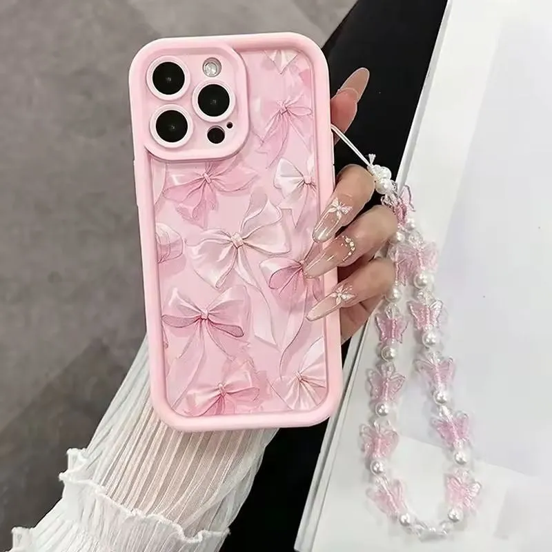 Pink matte silicone phone case with bow for iPhone 16