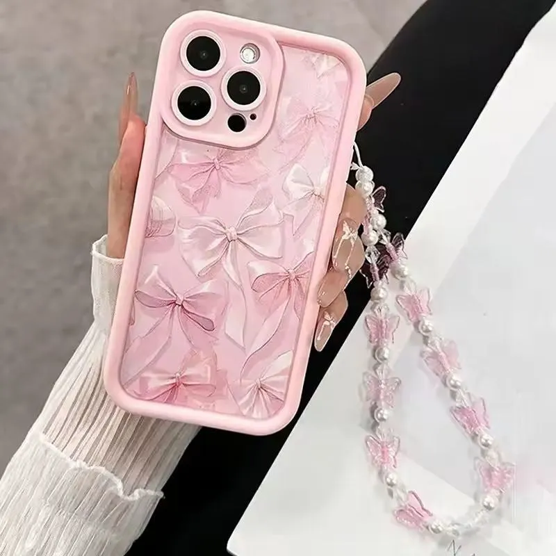 Pink matte silicone phone case with bow for iPhone 16