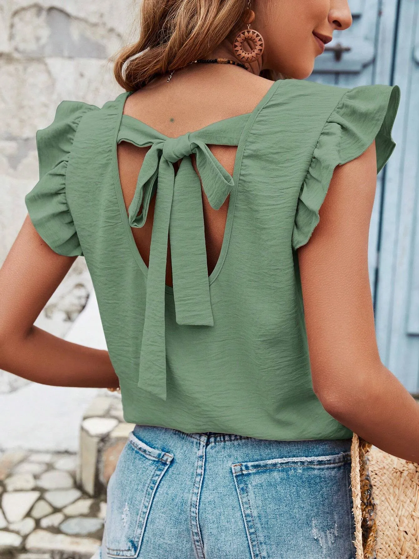 Women's solid colour round neck pullover blouse with ruffled sleeves and patchwork detail
