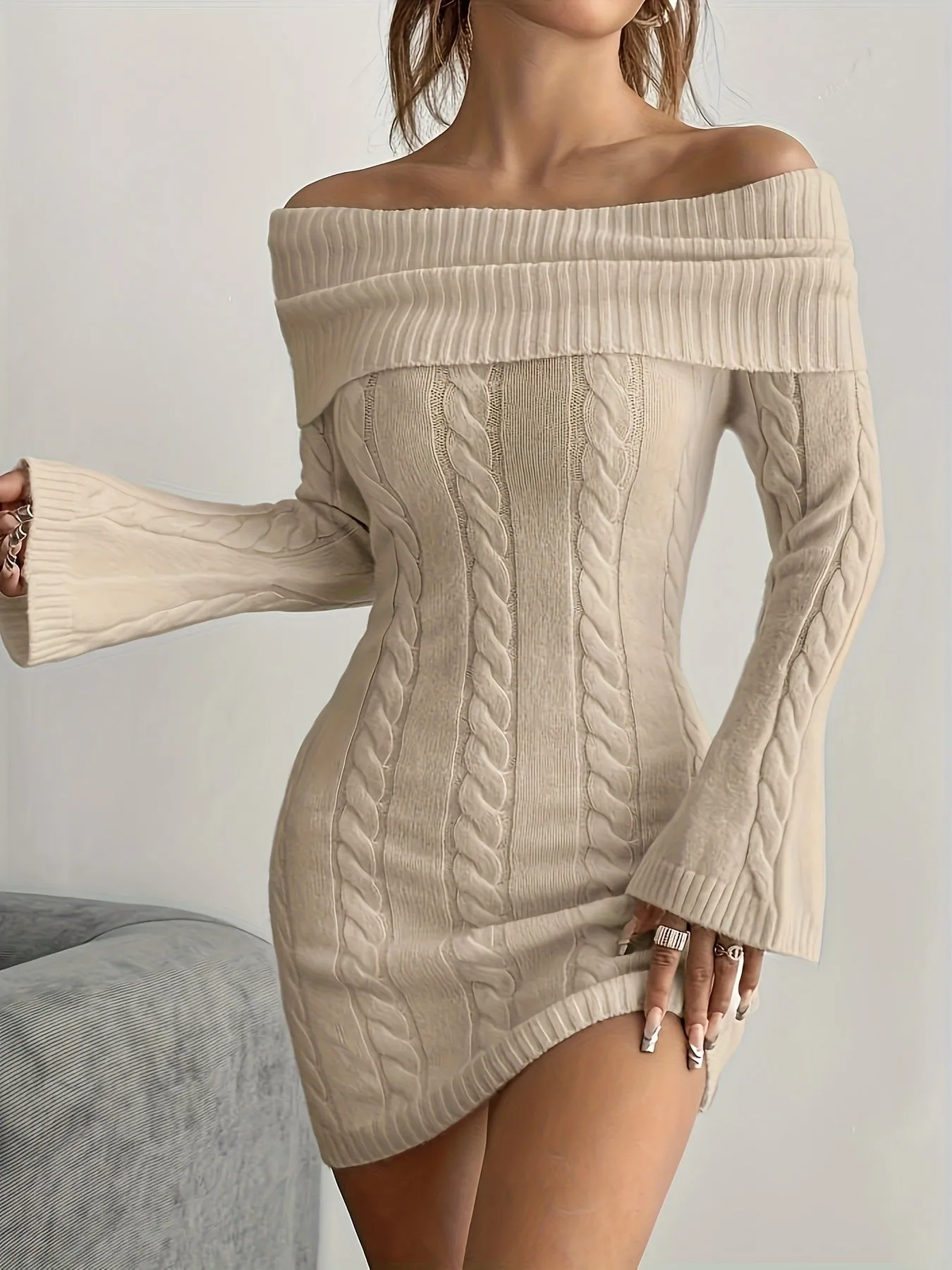 Women's loose polyester sweater dress with boat neck and flared sleeves in a casual ribbed knit finish