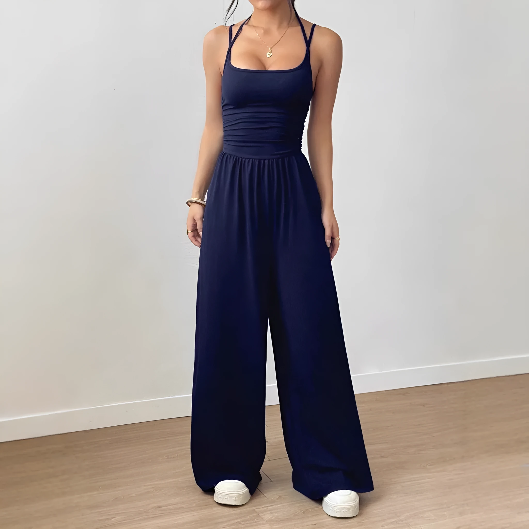 Women's casual jumpsuit with elastic waist and side pockets in black, navy, gray, and burgundy colour options