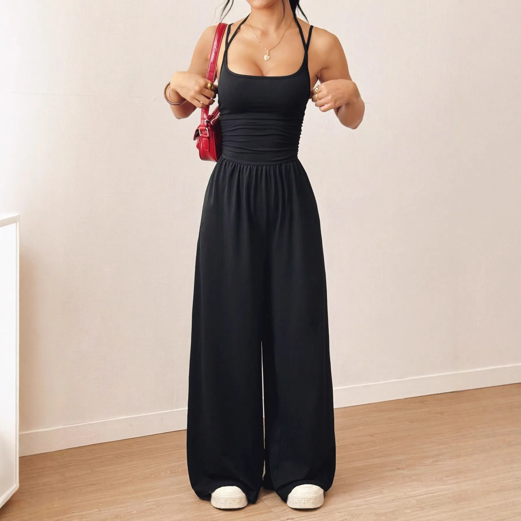 Women's casual jumpsuit with elastic waist and side pockets in black, navy, gray, and burgundy colour options