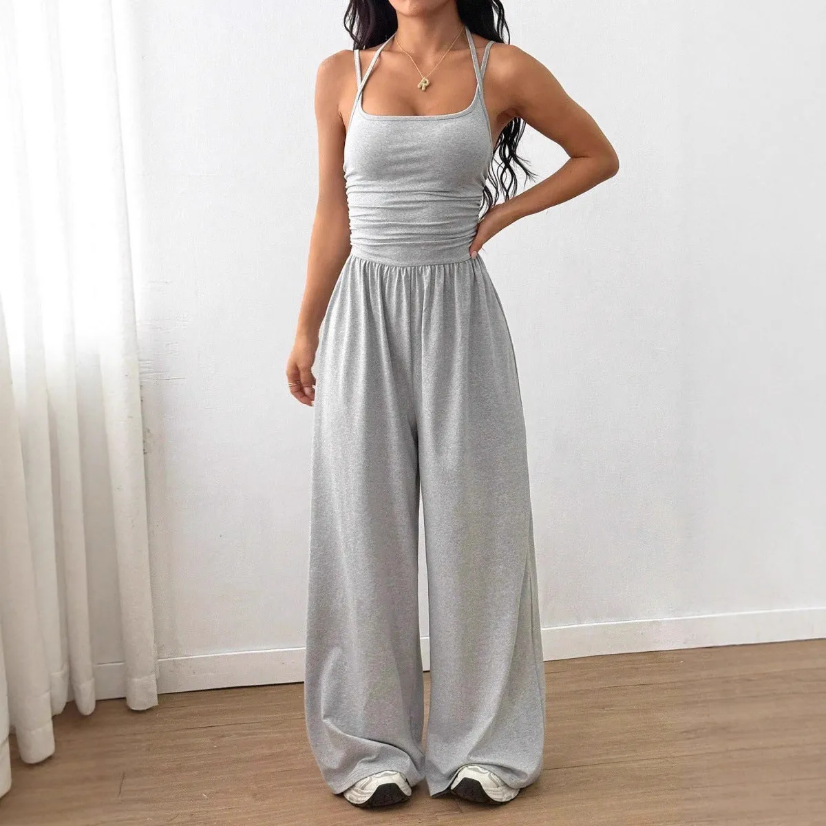 Women's casual jumpsuit with elastic waist and side pockets in black, navy, gray, and burgundy colour options