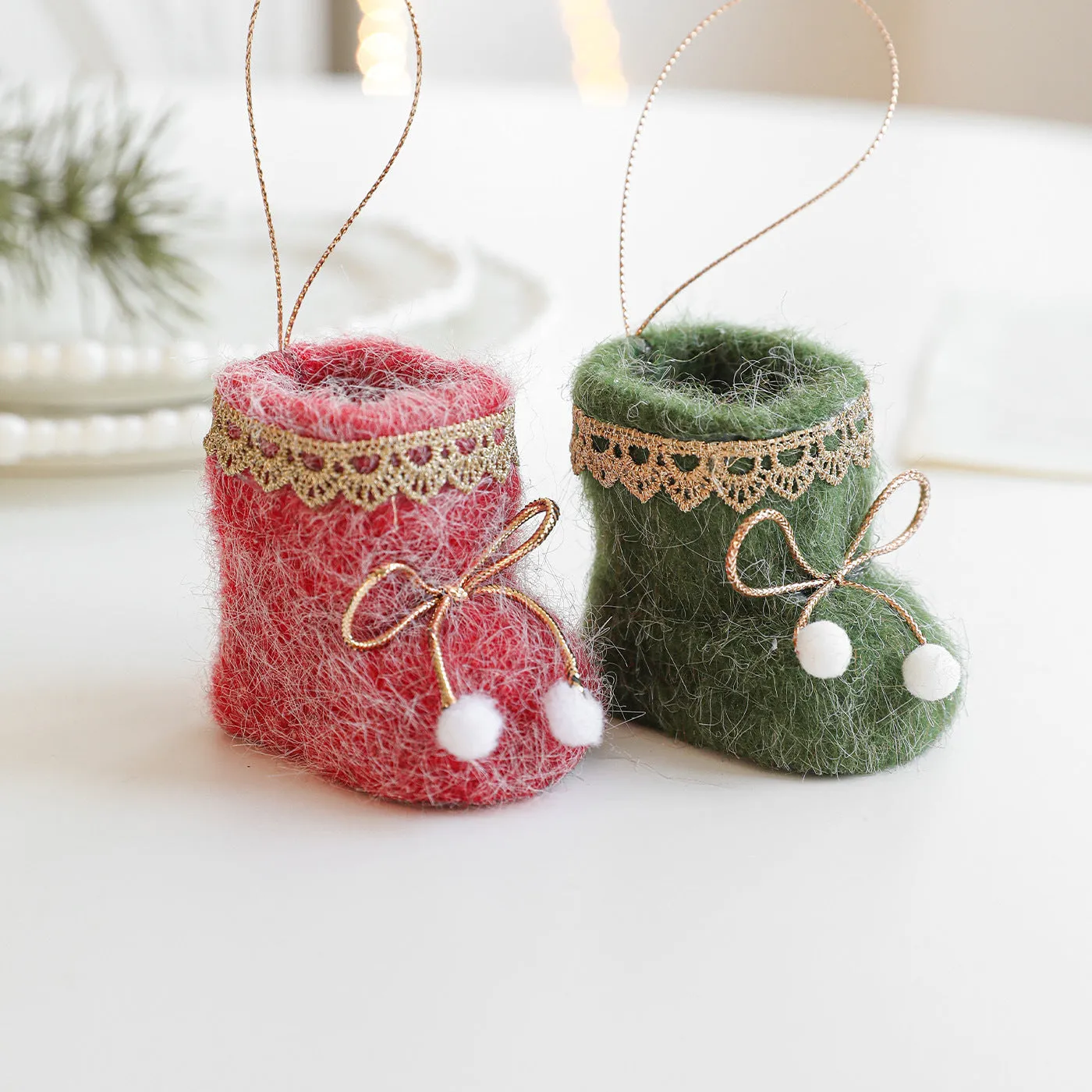 Plush fabric Christmas tree ornament shaped like a red boot with soft finish