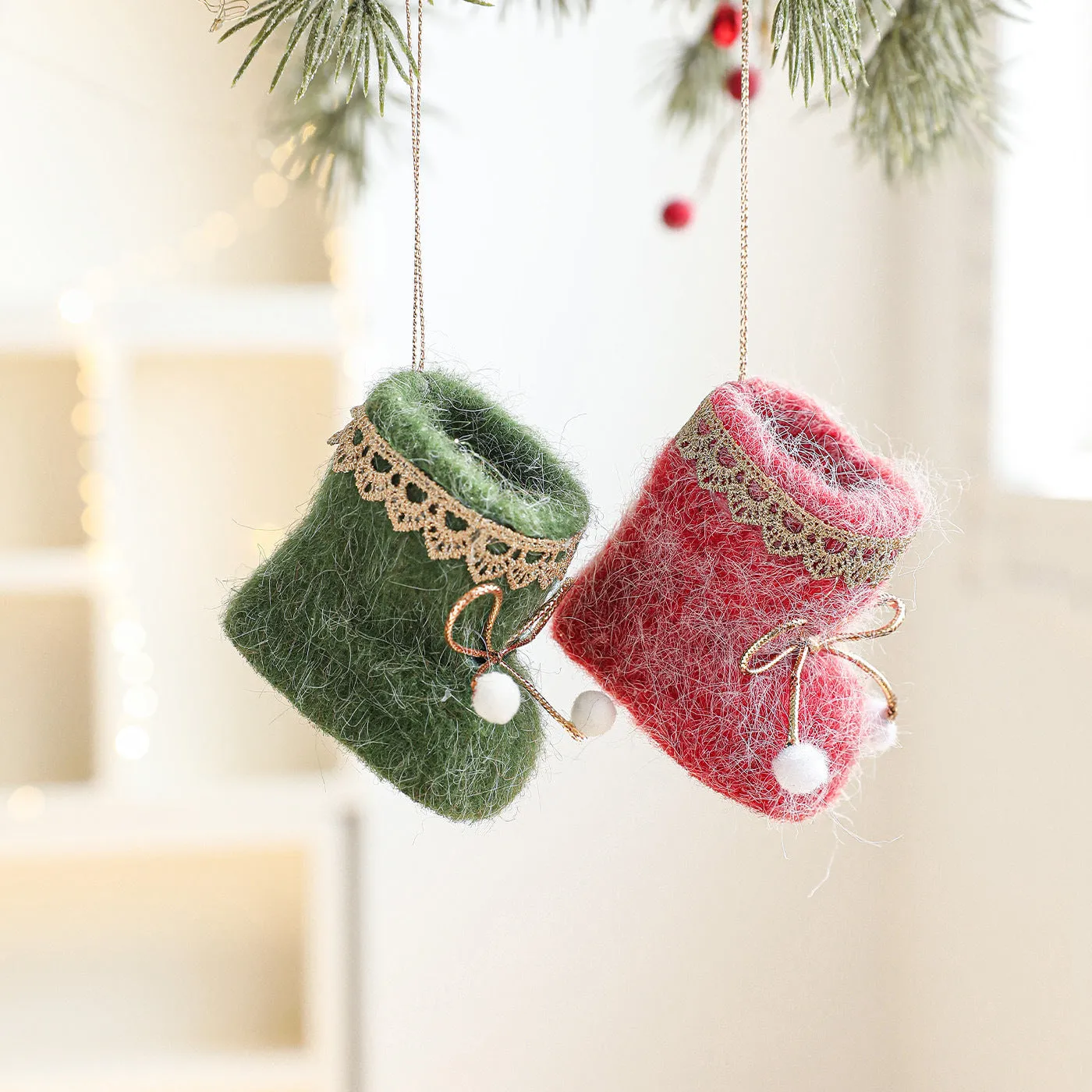 Plush fabric Christmas tree ornament shaped like a red boot with soft finish