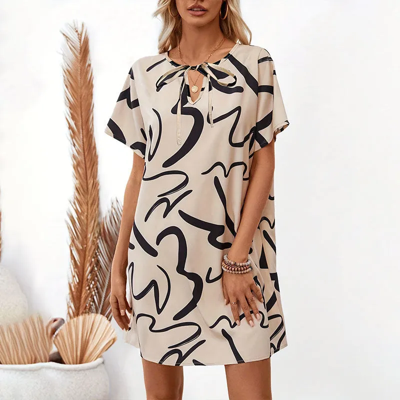 Khaki colour block print stretch polyester pencil dress with raglan sleeves on a model