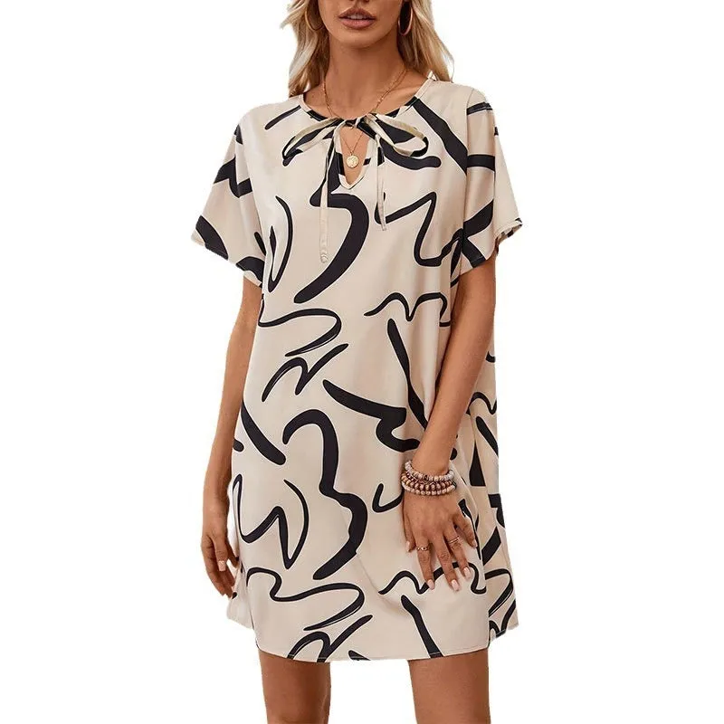 Khaki colour block print stretch polyester pencil dress with raglan sleeves on a model