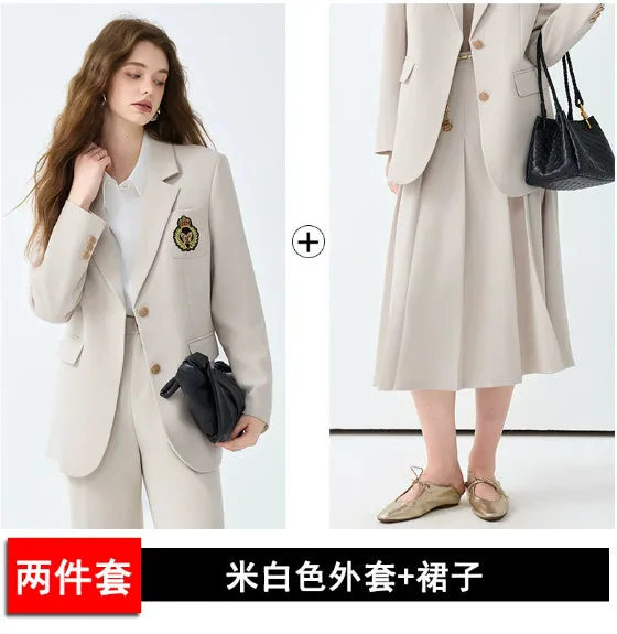 Women's black casual blazer set with long sleeves, solid colour polyester fabric, and matching trousers