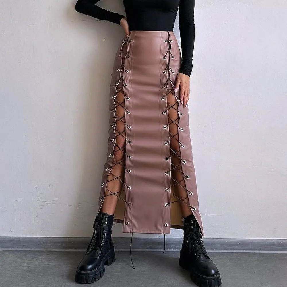 Women's black PU pencil skirt with slit and lacing detail, standing pose