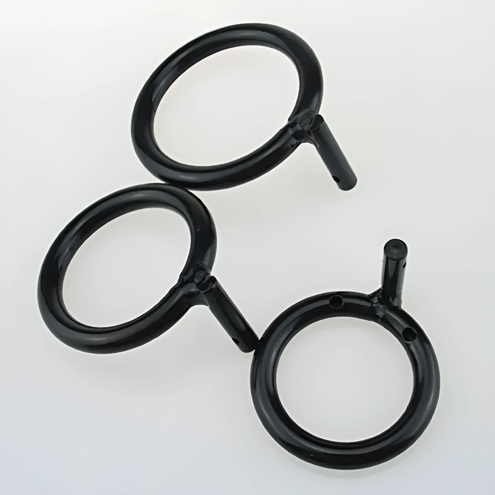 Black manganese steel men's chastity lock ring for sexual pleasure, shown on a neutral background