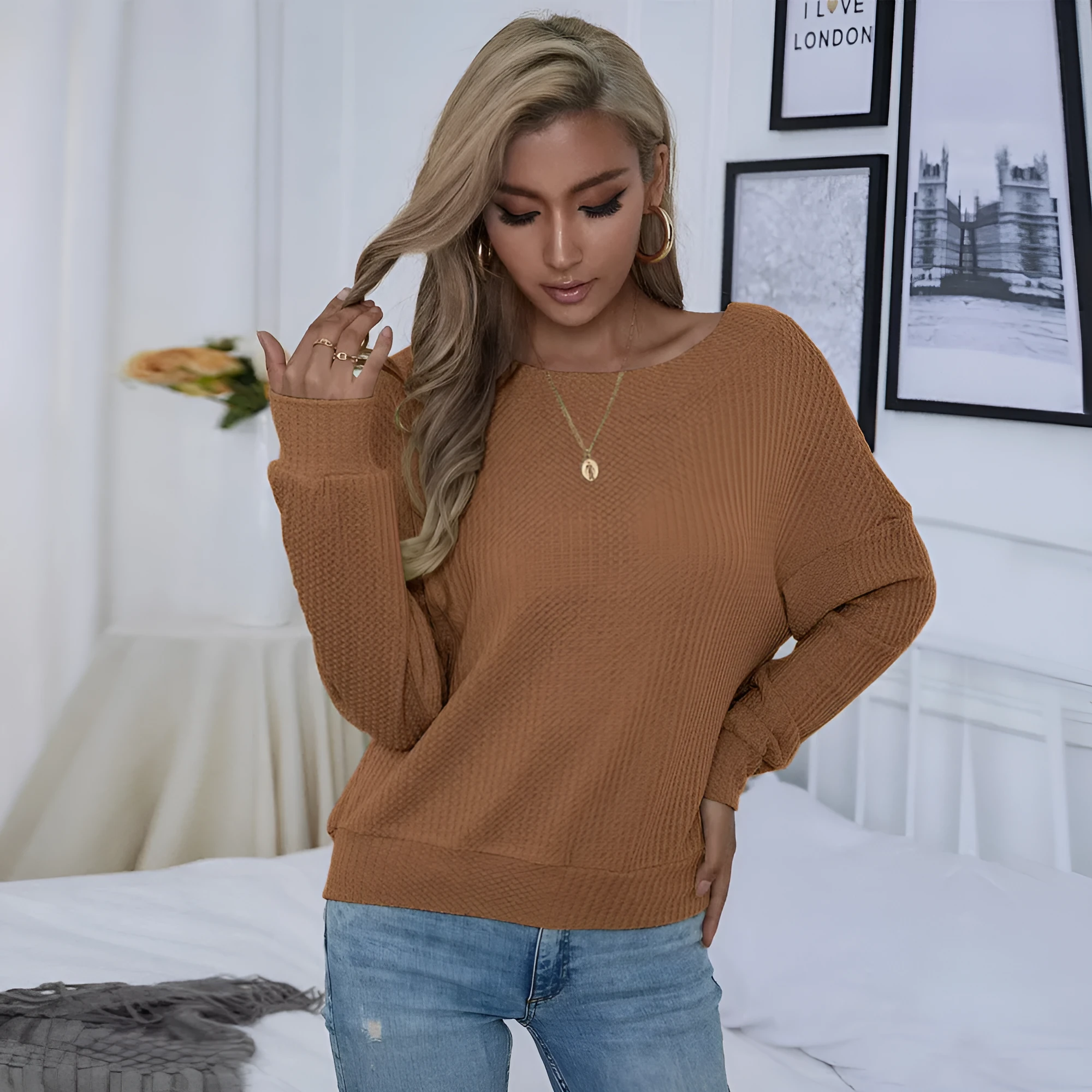 Women's loose casual backless long sleeve pullover in solid brown polyester with drop shoulders