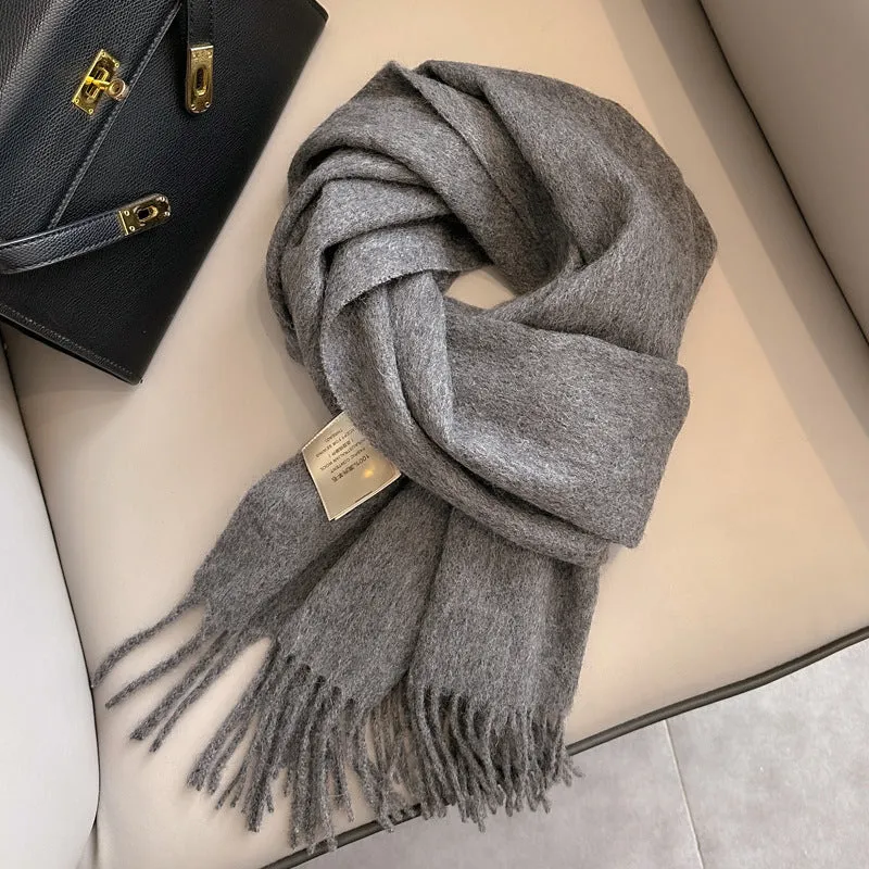 Pure wool mid-length narrow scarf with tassel detailing in beige, 180x32 cm, laid flat