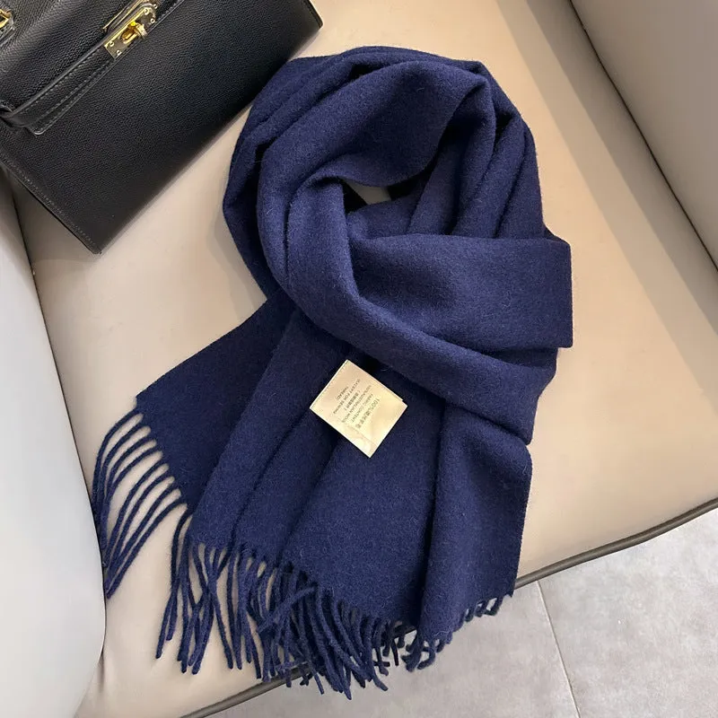 Pure wool mid-length narrow scarf with tassel detailing in beige, 180x32 cm, laid flat