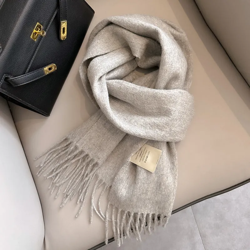 Pure wool mid-length narrow scarf with tassel detailing in beige, 180x32 cm, laid flat